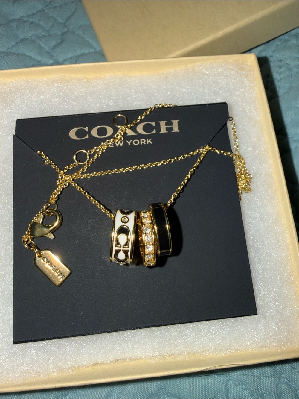Coach gold necklace